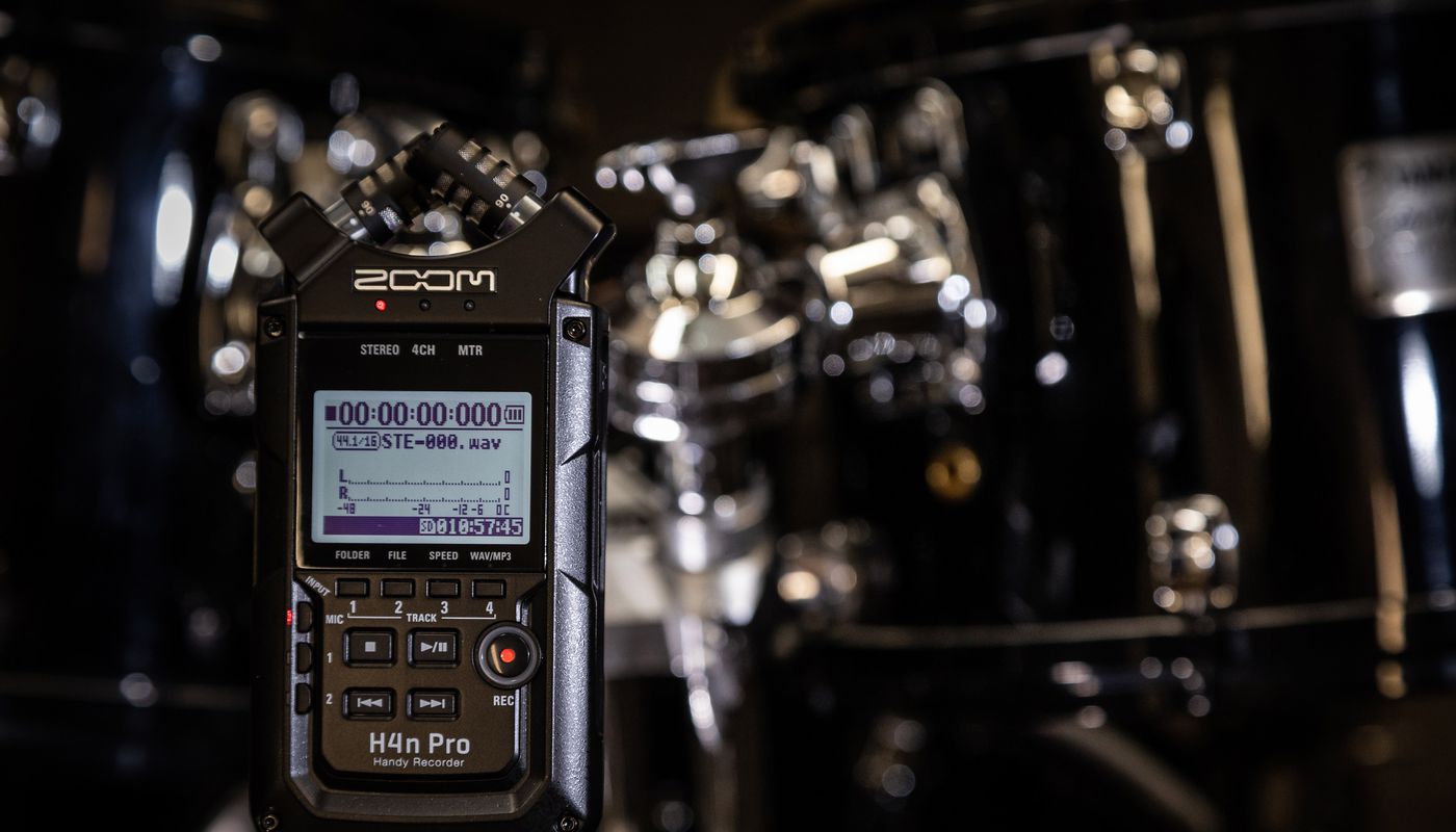 H4n Pro set up in front of a drum kit.