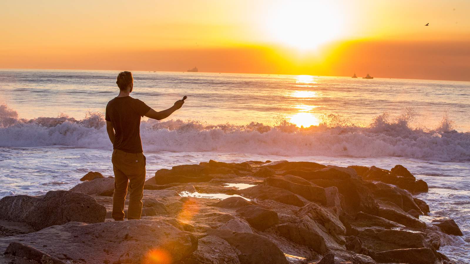 H1n Recorder being used on the beach at sunset